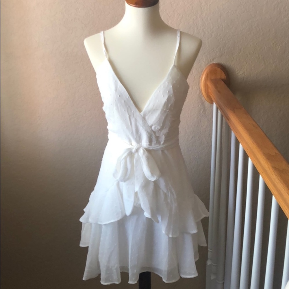 White ruffle mini dress